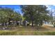Charming home surrounded by majestic trees, offering a sense of privacy at 4145 Rambler Ave, St Cloud, FL 34772
