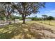 Well-maintained property with fenced yard and mature trees for shade at 4145 Rambler Ave, St Cloud, FL 34772