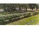 A charming residence nestled among mature trees and manicured hedges at 4145 Rambler Ave, St Cloud, FL 34772