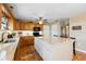 Bright kitchen featuring a large island, stainless appliances, and a trendy design at 4145 Rambler Ave, St Cloud, FL 34772