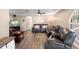 Comfortable living room with modern flooring and natural light at 4145 Rambler Ave, St Cloud, FL 34772