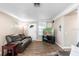 Living room with neutral colors and modern flooring at 4145 Rambler Ave, St Cloud, FL 34772