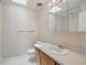 Well-lit bathroom with vanity and sink, ensuring comfort and functionality at 44 Fairway Cir, New Smyrna Beach, FL 32168