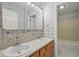 The bathroom has a double vanity and separate shower/tub area at 44 Fairway Cir, New Smyrna Beach, FL 32168