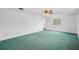 Expansive bedroom with neutral walls, ceiling fan and lots of natural light at 44 Fairway Cir, New Smyrna Beach, FL 32168