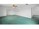 Inviting living room with ceiling fan, neutral walls and plenty of space at 44 Fairway Cir, New Smyrna Beach, FL 32168