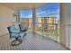 Balcony space with furniture and views of the city at 4670 Links Village Dr # A506, Ponce Inlet, FL 32127