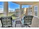Spacious balcony with patio furniture and beautiful views of the ocean and beach at 4670 Links Village Dr # A506, Ponce Inlet, FL 32127