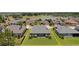 Aerial view of the home with the fenced in back yard with a lake in the background at 5430 Nw 35Th Lane Rd, Ocala, FL 34482