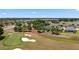 Beautiful home on golf course features lush greenery, mature trees, and inviting outdoor spaces at 5430 Nw 35Th Lane Rd, Ocala, FL 34482