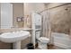 Well-lit bathroom with a single sink, modern vanity, and tiled shower-tub combo at 5430 Nw 35Th Lane Rd, Ocala, FL 34482