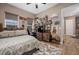 Bedroom showcasing rustic decor, with mounted decor and a comfortable bed at 5430 Nw 35Th Lane Rd, Ocala, FL 34482
