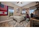Comfortable bedroom with ample natural light, desk, and a cozy rug at 5430 Nw 35Th Lane Rd, Ocala, FL 34482