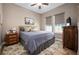 Cozy bedroom featuring neutral colors, a large bed, and ample natural light at 5430 Nw 35Th Lane Rd, Ocala, FL 34482