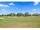 Picturesque golf course view with lush green fairways and strategically placed sand traps at 5430 Nw 35Th Lane Rd, Ocala, FL 34482