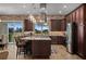 Stylish kitchen featuring an island with seating, pendant lighting, and modern appliances at 5430 Nw 35Th Lane Rd, Ocala, FL 34482
