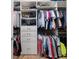 Walk-in closet featuring custom shelves, hanging rods, and built-in drawers for optimal storage at 5430 Nw 35Th Lane Rd, Ocala, FL 34482