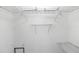 Bright closet features shelving for storing clothes and accessories at 576 Belltower Ave # 100, Deltona, FL 32725
