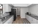 Updated kitchen featuring modern appliances, ample counter space, and stylish backsplash at 576 Belltower Ave # 100, Deltona, FL 32725