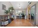 Bright home office with hardwood floors, a large desk, and plenty of storage at 5776 White Acres Ln, Port Orange, FL 32127
