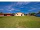 Expansive backyard with lush grass, perfect for outdoor activities and gatherings at 707 Hamilton St, New Smyrna Beach, FL 32168