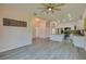 Open concept living room and kitchen with modern lighting at 707 Hamilton St, New Smyrna Beach, FL 32168