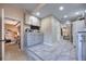 Finished basement with kitchenette, laundry area, and tile floors at 738 Lindley Blvd, Deland, FL 32724