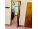 Walk-in closet featuring ample storage space with shelving and hanging racks at 7380 Orange Ave, Indian Lake Estates, FL 33855
