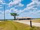 Beautiful view of the Indian Lake Estates' community area and lake access point at 7380 Orange Ave, Indian Lake Estates, FL 33855