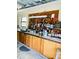 Garage workshop area with pegboard organizer and work surface at 7380 Orange Ave, Indian Lake Estates, FL 33855