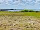 Expansive view of the pier and lake area at Indian Lake Estates, Florida at 7380 Orange Ave, Indian Lake Estates, FL 33855