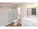 Modern bathroom with a walk-in shower, updated vanity, and bright lighting at 810 Sylvia Dr, Deltona, FL 32725