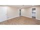 Bright bedroom featuring wood floors and direct access to an en-suite bathroom at 810 Sylvia Dr, Deltona, FL 32725