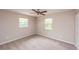 Cozy bedroom with neutral carpet, providing a peaceful retreat at 810 Sylvia Dr, Deltona, FL 32725