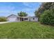 Charming single-story home features a well-manicured lawn and an attached garage in a desirable neighborhood at 810 Sylvia Dr, Deltona, FL 32725