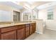 Bathroom with double vanity, granite countertops, and lots of space at 8832 Ribault Ave, Orlando, FL 32832