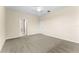 Spacious bedroom features neutral carpet, a ceiling fan, and great natural light at 8832 Ribault Ave, Orlando, FL 32832