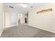 Cozy living room features plush carpeting and a ceiling fan for added comfort at 8832 Ribault Ave, Orlando, FL 32832