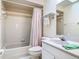 Bathroom with a tub, shower, toilet and sink at 907 Silver Leaf Pl, Port Orange, FL 32127