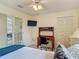 Bedroom featuring a desk, a bed, closet, and French doors to another room at 907 Silver Leaf Pl, Port Orange, FL 32127