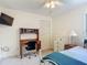 Bedroom featuring a desk, a bed, and a closet at 907 Silver Leaf Pl, Port Orange, FL 32127