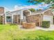 Charming brick home featuring a well-manicured lawn and attached two-car garage at 907 Silver Leaf Pl, Port Orange, FL 32127