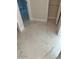 Hallway view showing a closet and entry to another room at 908 Boulder Dr, South Daytona, FL 32119
