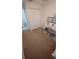 Functional bedroom with a closet, vanity, and neutral carpet flooring at 921 Valleydale Ave, Deland, FL 32720