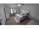 Serene bedroom featuring a decorative bed, soft lighting, and coordinated decor for a restful ambiance at 921 Valleydale Ave, Deland, FL 32720