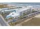 Aerial view of the beachfront property with multiple buildings, parking, and easy beach access at 935 S Atlantic Ave # 363, Daytona Beach, FL 32118