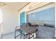 This balcony features comfortable seating with a great ocean view at 935 S Atlantic Ave # 363, Daytona Beach, FL 32118