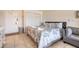 Interior view of condo featuring bed, couch, entry, and view of linens at 935 S Atlantic Ave # 363, Daytona Beach, FL 32118