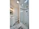 Bathroom featuring tiled shower with glass door, modern fixtures, and a vanity at 940 Valencia Ave, Daytona Beach, FL 32114