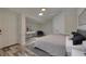 Bedroom with a neutral color palette, a sky light, and wood-look flooring at 940 Valencia Ave, Daytona Beach, FL 32114